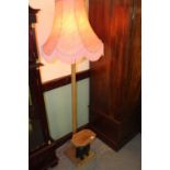 Standard lamp with attached elephant table