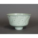 A celadon glazed Studio porcelain bowl by Derek Clarkson (1915-2017) of Art Deco design, the stepped