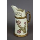 A Royal Worcester 'Blush Ivory' porcelain ewer, decorated in colours and gilt with floral sprays and