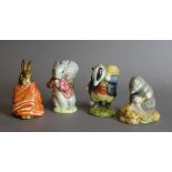 Four Beswick pottery 'Beatrix Potter' figures - 'Tommy Brock', 'Timmy Tiptoes', 'Poorly Peter