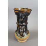 A late 19th / early 20th Century brown glazed terracotta vase of 16th/17th Century design,