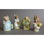 Three Beswick pottery 'Beatrix Potter' figures - 'Mr Alderman Ptolemy', 'Mrs Rabbit', 'Aunt