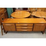 1970's teak dining room suite - extending table, four chairs and sideboard