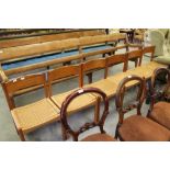 Six 1970's teak chairs with seagrass seats