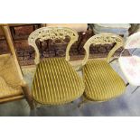 2 cream nursing chairs