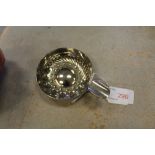 A silver plated circular Taste du Vin, 8cm diameter Good overall
