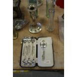 White metal candlestick, silver spoons etc