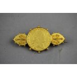 yellow metal coin brooch mounted 12grams