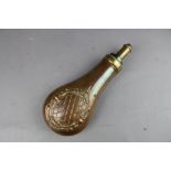 Large copper powder flask with embossed decoration