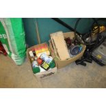 Box of pesticides and fish food and box of saws