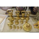 12 brass bell weights and other set of weights