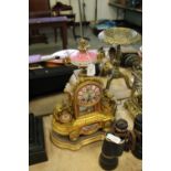 19th century French gilt & porcelain clock with key and pendulum
