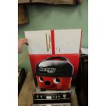 Boxed Henry vacuum cleaner