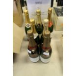 Two bottles of non vintage Laurent Perrier Brut champagne and five other bottles of champagne