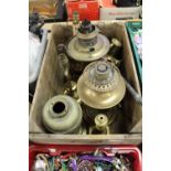 Box of brass lamps