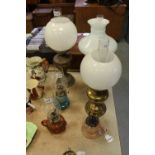 3 brass & 3 glass oil lamps