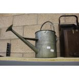 Galvanised watering can