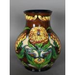 A modern Moorcroft tube lined pottery vase, decorated with dahlias, 24cm high, No. 37 of 250,
