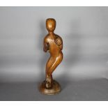 ARR Peter Broadhurst (20th Century Cumbrian) - Wooden carved figure - Skier, 56cm high, unsigned,