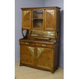 An Art Nouveau walnut and burr elm buffet designed by Edouard Diot, with gilded and floral