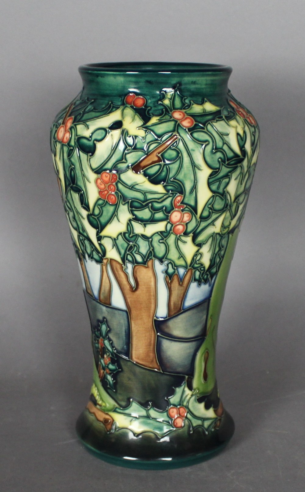 A modern Moorcroft tube lined pottery vase - Woodland scene, 17cm high, dated '97 with initials