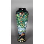 A modern Moorcroft tube lined pottery 'Serendipity' vase, 37cm high, No. 10 of 300, dated 2000, in