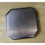 An Elizabeth II silver octagonal compact of Art Deco design, with engine turned ornament, 7.5cm