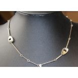 A Georg Jensen 'Pebbles' necklace, design number 445 by Line Falkesgaard, marked 925s, 44cm long,