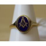 A gentlemans's 9ct gold and blue enamelled Masonic signet ring, the oval swivelling face decorated