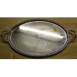 A modern silver oval serving tray, with gadrooned edge and reeded handles, Marks for Sheffield 1969,