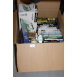 Box of miscellaneous DVDs, books etc