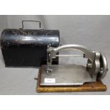 Miniature Portable Sewing Machine bearing the inscription "The Ideal" in Metal Case