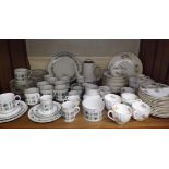 Late 19th Century Coalport Tea Service comprising Seven Cups, Saucers, Side Plates, Milk Jug, Slop