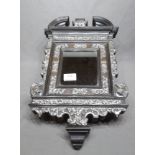 Ebonized Framed Mirror with White Metal Mounts with shaped sides, broken pediment top, late 18th