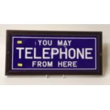 Framed sign 'You May Telephone From Here'. Condition report: see terms and conditions