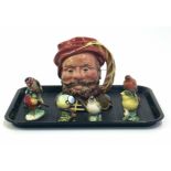 Beswick Falstaff character jug also six small birds Condition report: see terms and conditions