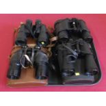 Four pairs of binoculars and four cases. Condition report: see terms and conditions