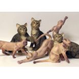 Four Border Fine Arts stone range cats together with three Country Artists cat figures. Condition