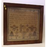 Sampler in original frame dated 1853. Condition report: see terms and conditions