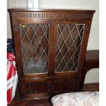 Reproduction oak glazed and leaded bookcase Condition report: see terms and conditions