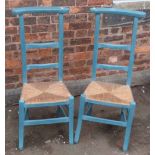 Pair of Victorian high backed ladder-back rush seated chairs. Condition report: see terms and