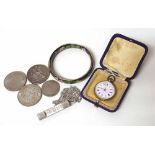 Continental pocket watch, silver necklace, two crowns, a dollar and a penny together with a