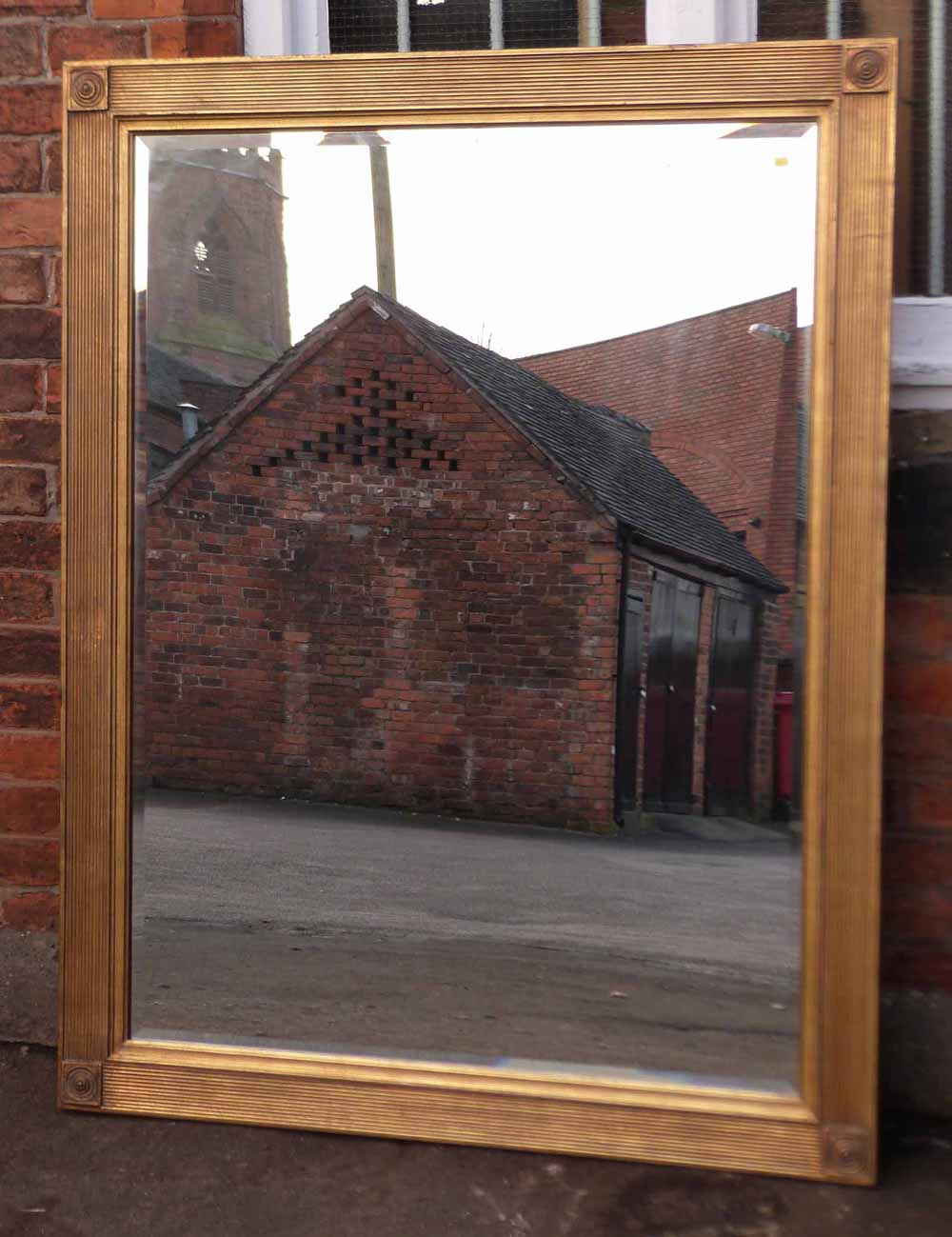 Modern gilt wall mirror. Condition report: see terms and conditions