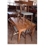 Pine scrub-top kitchen table and six Victorian style chairs. Condition report: see terms and