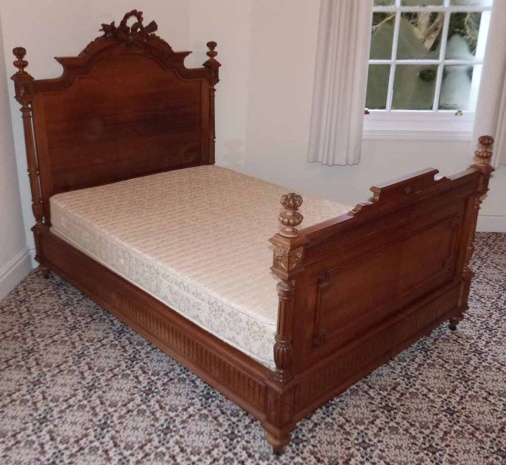 French 4'6" bedstead complete with mattress. Condition report: see terms and conditions