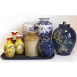 Collection of art pottery vases, blue and white vase and three art glass vases. Condition report: