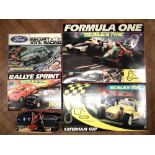 Four Scalextric boxed sets, to include Formula One set (unopened with original cellophane