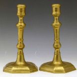 Pair 18th century brass candlesticks, the knopped stems on octagonal bases, height 20cm.