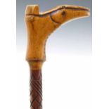 Hardwood walking cane, the handle in form of boot, length 93cm.
