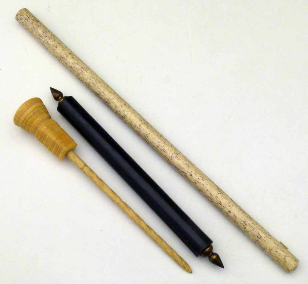 Whale bone parallel rule, length 43cm; ebonised parallel rule with brass ends, 28cm; marine bone